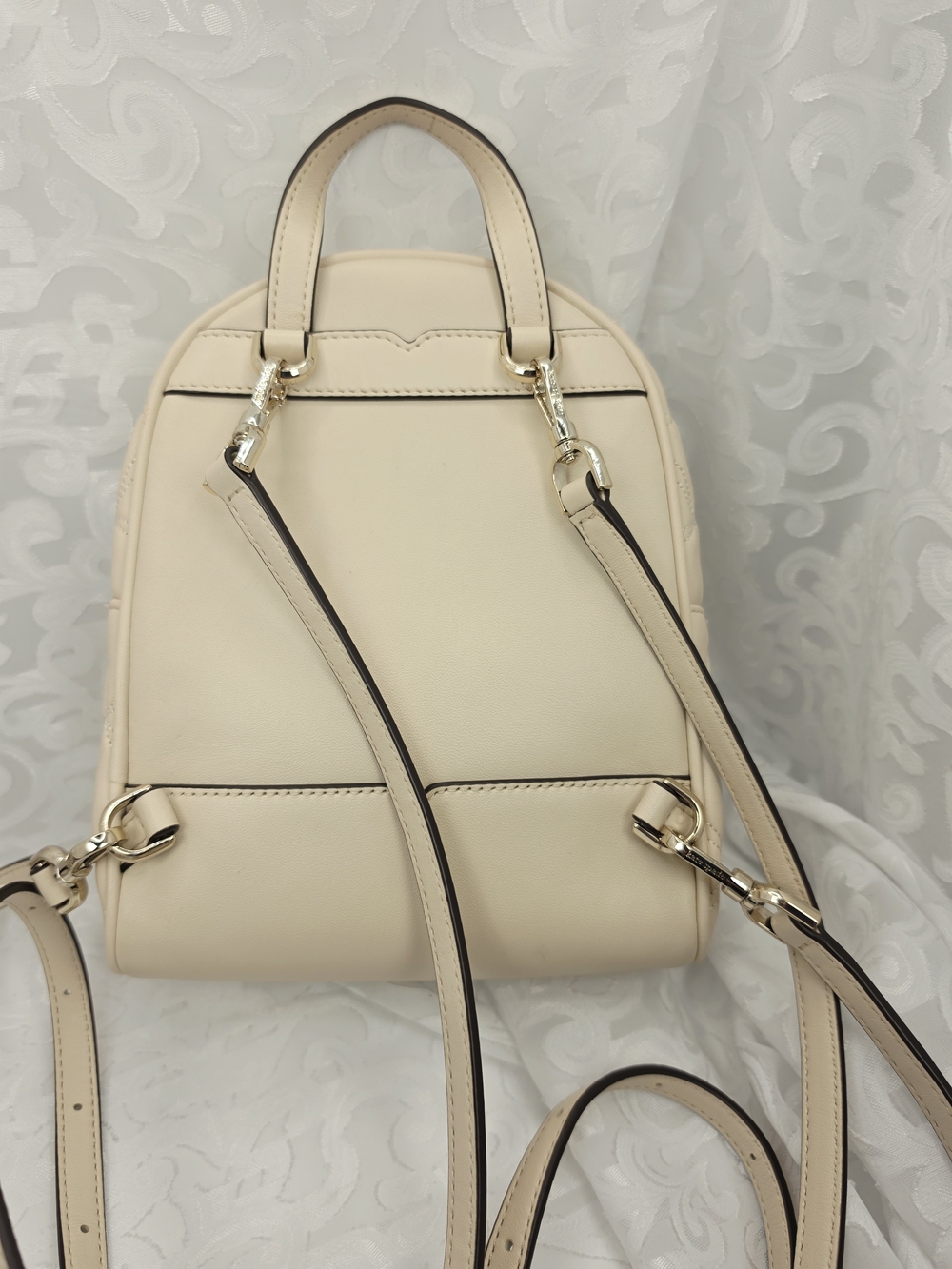 kate spade New York Quilted Cream Mini Backpack - Picture 9 of 10